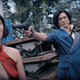 Spike holding a gun at an annoyed Faye while Jet holds Ein.